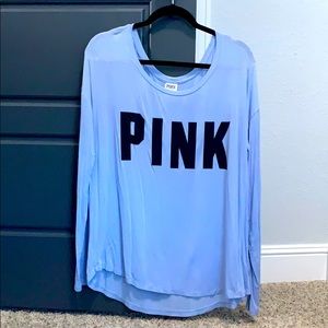 Pink long sleeve shirt.
